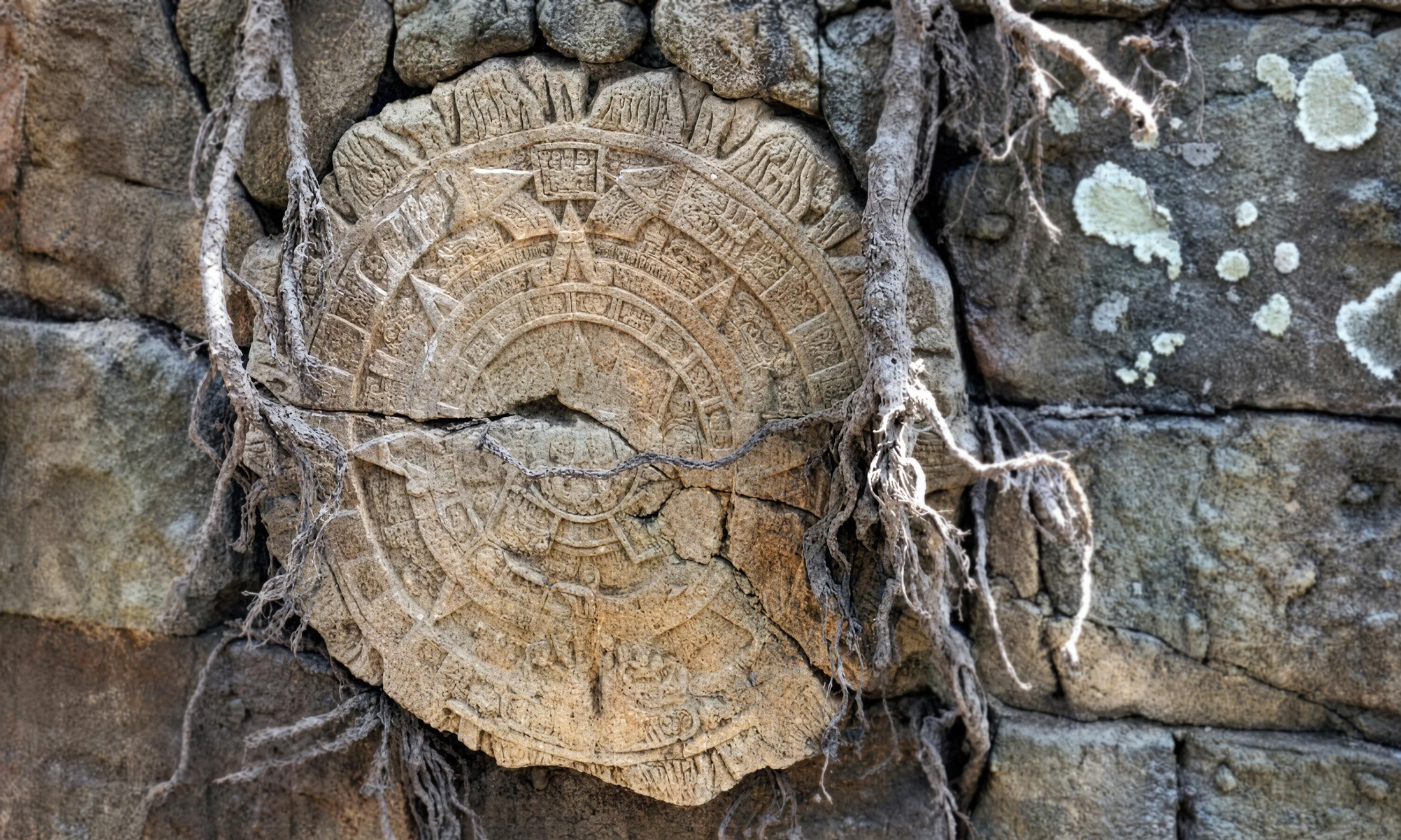 Mayan calendar stone sculpted into rockwork